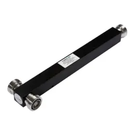 RF coaxial component: a black rectangular bar with silver circular connectors on both ends, likely a module to join or couple coaxial cables.